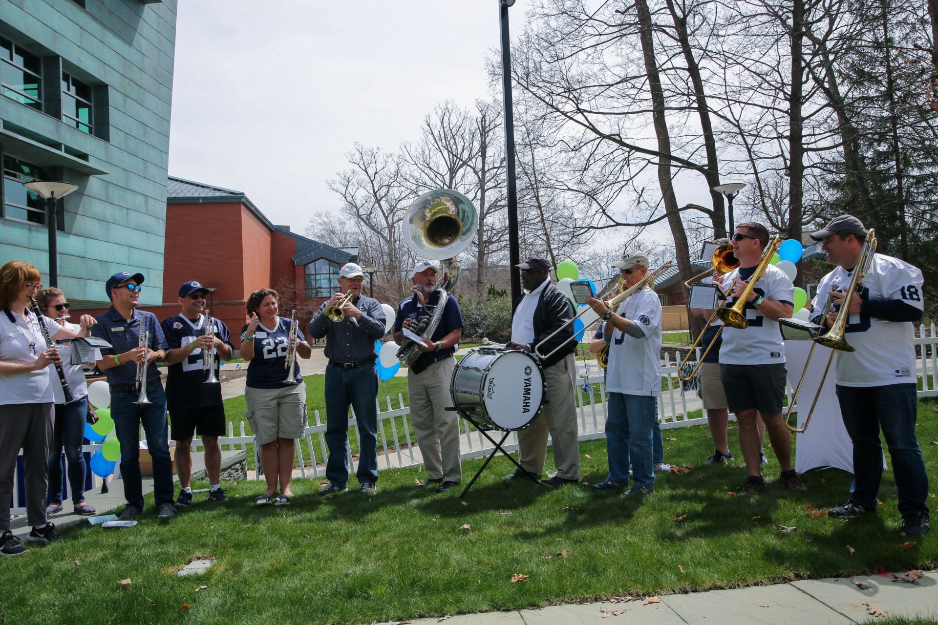 Alumni Blue Band member performing during the Blue and White Tailgate.