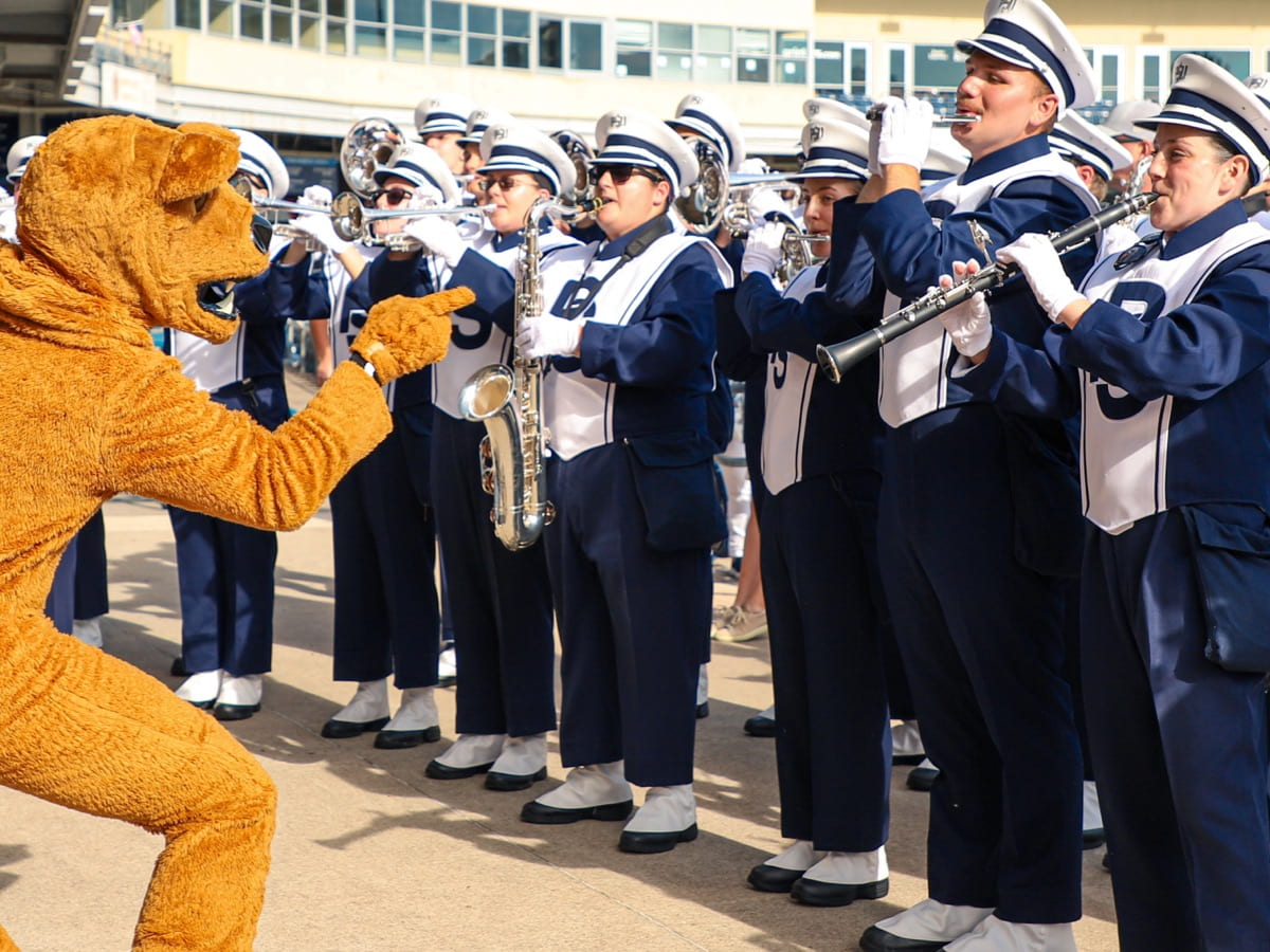 Masked Blue Band performing in front of Beaver Stadium.
